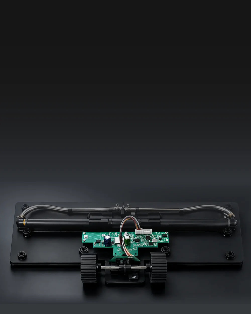 The SmartMop base, opened up: the circuit board, pump line and wheels