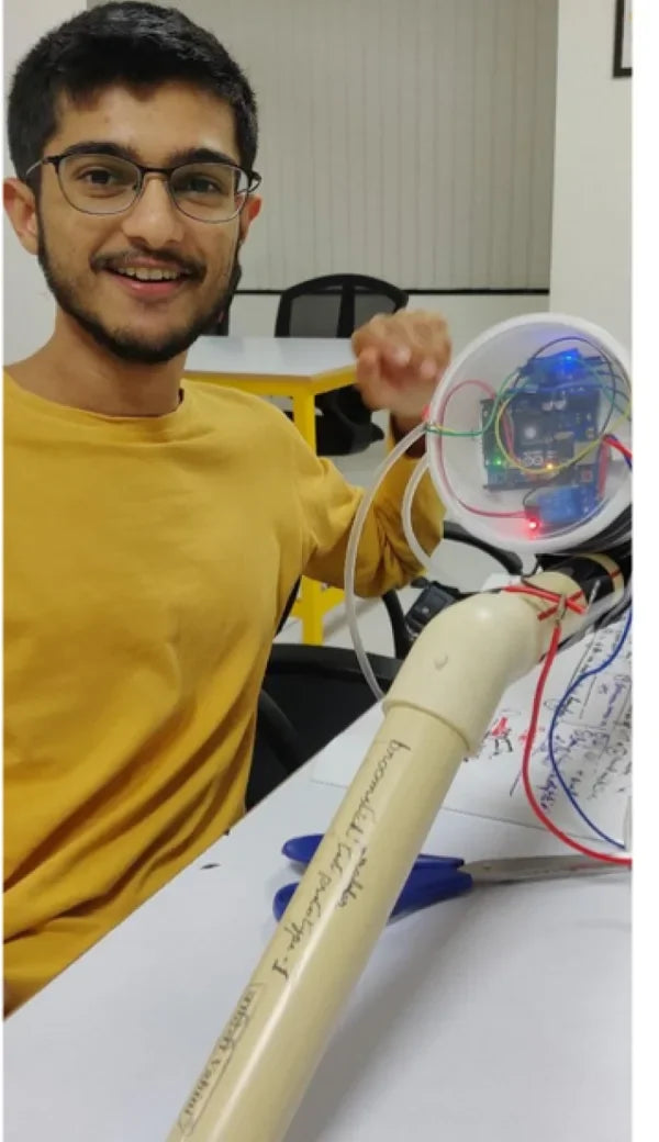 Mehul with an early SmartMop prototype and its circuit