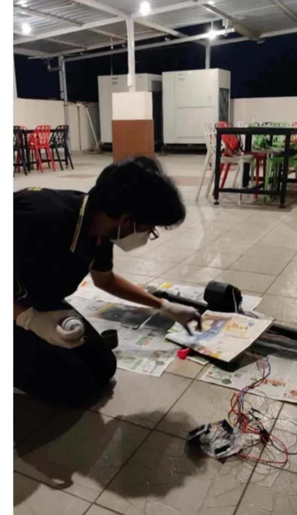 Wiring a SmartMop prototype on the workshop floor