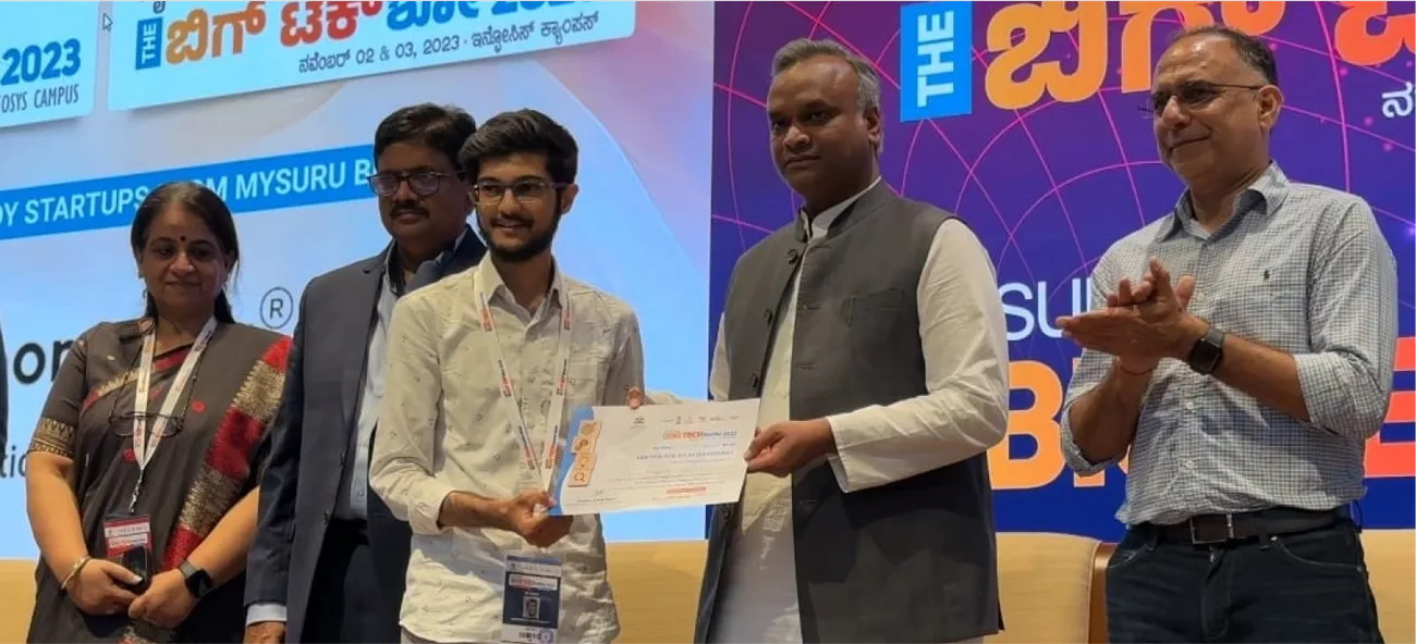 Caspian receiving a certificate at The Big Tech Show 2023, Mysuru