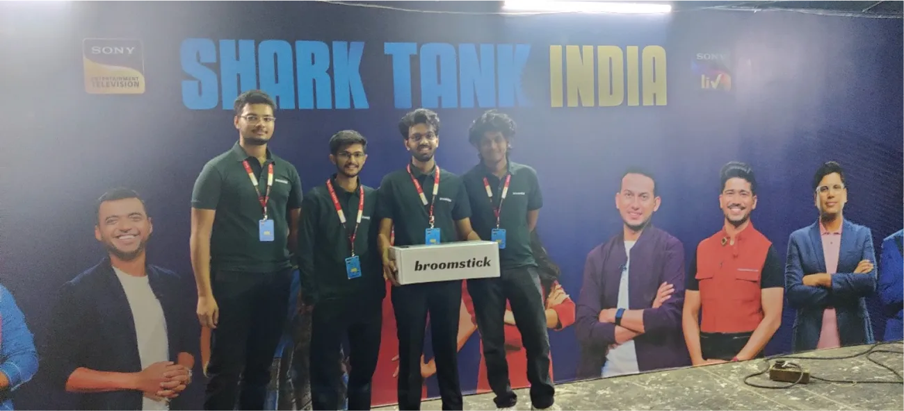The Caspian team on the Shark Tank India set with the broomstick box